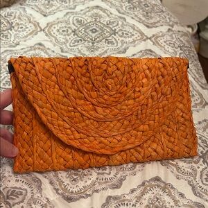 Orange Woven Clutch Bag